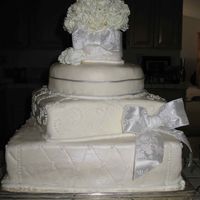 My First Fondant Wedding Cake This was a 4 teir wedding cake, covered in MMF.