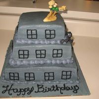 Black Spiderman Cake This cake is of Spiderman climbing the side of a building.