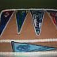 Pennant Flags Cake was made for sports fanatic who was turning 50. The first time I made a cake using FBCT--There were a lot of mistakes but he was still...