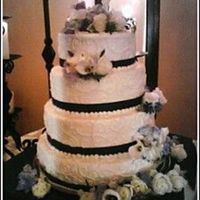 127438345093_290.jpg This was a 4 tier wedding cake done 6/18/06.The cake was white or chocolate cake with fresh fruit fillings.The icing is all buttercream(I...