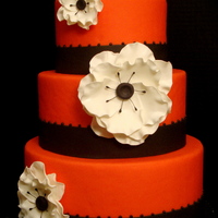 Coral And Anemones The colors were coral and black with white. I love these flowers!!