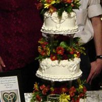 First Time With Real Flowers An at-home wedding reception for family. They wanted a celtic/medieval theme, so I went with a celtic symbol for eternity. Thought I would...