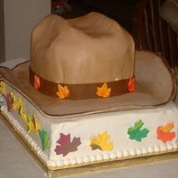 Cowboy Hat My first cowboy hat! It was for a groom's cake and she wanted to incorporate fall leaves. Thanks to thecakemaker for all of her help...