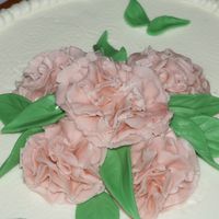 First Gum Paste Flowers They took a lot longer to make then I was expecting. The cake is strawberry with strawberry filling.