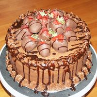Chocolate Covered Strawberries On Devil's Food Cake These are my first dipped strawberries. The cake is Devil's Food Cake, I slices fresh berries and added them to the filling. The...