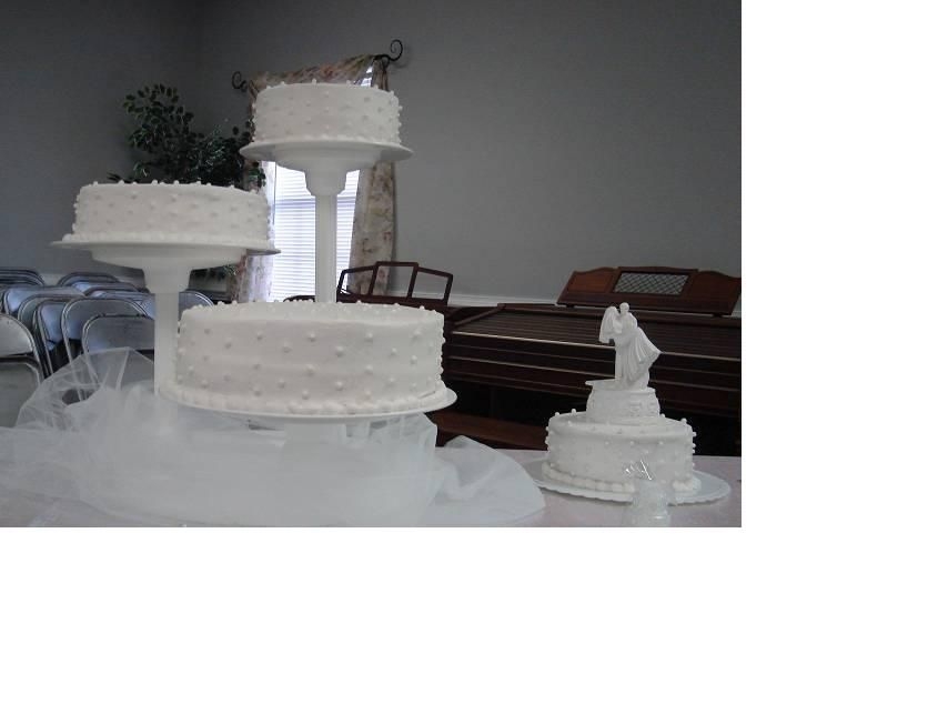 My First Wedding Cake Made this cake for a church friend this past weekend. Vanilla cake with pineapple filling/ Buttercream icing with edible pearls.