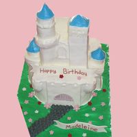 Castle I made this based of a pic the mother gave me of a porcelain castle. I did the best I could to match. It is all cake with buttercream icing...