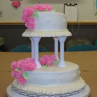 Wilton Course Iii Final Cake Chocolate fudge cake, chocolate whipped cream filling, covered in MMF, Wilton fondant roses and leaves