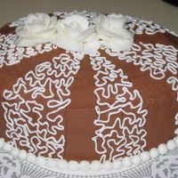 Thank You Cake My first attempt at cornelli lace. NEEDS WORK! Chocolate buttermilk cake, chocolate cream cheese icing, BC roses.
