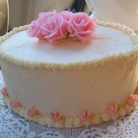 Get Well Cake Butter cake, strawberry mousse filling, IMBC icing and fondant roses (on top)