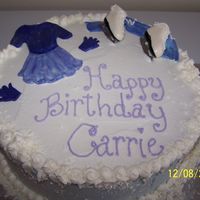 Ice Skater's Birthday Cake I made this cake for my niece's birthday. It is chocolate with cookies and cream filling. The dress, mittens, scarf and skates are...