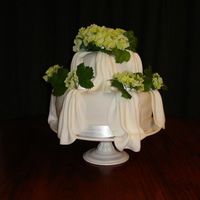 Bridal Shower Chocolate Bridal Shower cake. I think it looks rather odd because of the flowers sticking out so far from the cake. But it's like that...