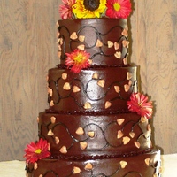 Autumn Wedding Butter Cake with Bitter Sweet Chocolate Frosting. On the sides are piped vines and royal icing piped leaves. The picture truly does not do...