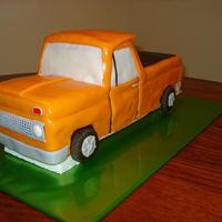 65 Chevy Truck Chocolate 1965 Chevrolet Truck covered in fondant with fondant accents.