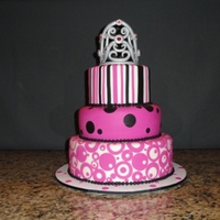 Ellie's 5Th Bday Fondant covered cake, and gumpaste tiara (tutorial found on Youtube). Customer provided picture. Thanks for looking.