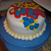 2Nd Picture Also this was my first try w/ roses and it's w/ buttercream.