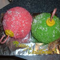 2 Christmas Ornaments This is my first attempt at a 3D cake. It's all buttercream sprinkled with powdered sugar snow. :0)
