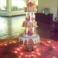 Chocolate Wedding this was inpire by a cake shown in hereit was made to please a traditional mom and a modern bridethe forst is chocolate fondat and cookie...