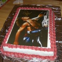 Bon Jovi Birthday My first paid cake *yay* Ths is was made for a friend's wife who love Bon Jovi! Choc. cake with BC frosting and dec's. The photo...