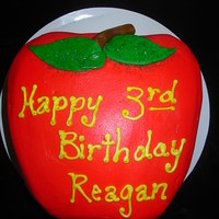 Apple Cake Buttercream with fondant stem and leaves.