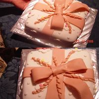 First Fondant Cake This was my first fondant cake which I made in my Wilton Course III class. I had lots of fun making it, but I hate the taste of the box...