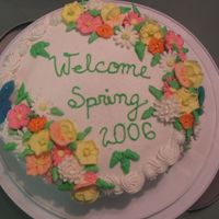 Sring Is Almost Here... Chocolate cake with sweet condensed milk filling decorated with royal icing flowers and color flow birds. Icing is buttercream.