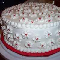 Tiered Christmas Cake This is the bottom of a 2-tier cake made for a family Christmas party.