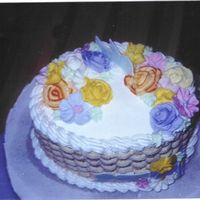 Wilton Course Ii This is from my Wilton Course II class. I used brown for the basket weave to make it look more realistic. Thanks for looking.