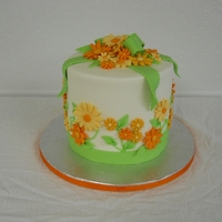 Voni Quick birthday cake for a friend. She loves my wedding cake design that is similar but wanted to change the colors to orange and green....