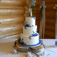 Theresa 6"-9"12" round cake. Bride saw this cake in a magazine and rought it to me. Chocolate cake with caramel cream filling and...