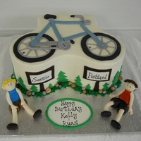 Seattle To Portland Birthday cake for a set of twins who do a bike race every year from Seattle to Portland. Chocolate cake with raspberry filling and vanilla...