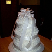 My 1St Wedding Cake I did this cake for my two nieces when they came home to celebrate with family.