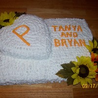 Bryan And Tanya's Cake 1/2 sheet cake (1/2 choc. and 1/2 yellow) This was ordered on Wed., done by Fri. for my nephew and his bride.