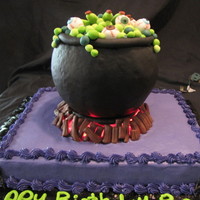 Halloween Cauldron Birthday Cake Cauldron b-day cake. Cauldron is styrofoam covered in fondant. Iced in buttercream, all other decorations fondant. Underneath cauldron is...