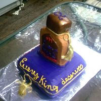 Crown Royal Bottle On Pillow this was my first attempt at a pillow cake and stand up bottle. not as good as i had imagine, but okay i guess? This was for dh's...