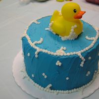 Duckie Cake This cake was so much fun! I made it for my son's first birthday. The rubber duckie is plastic, everything else is buttercream. I am...