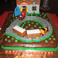 Thomas The Train On this one I did two 9x13 cakes and put them together. Iced the whole thing in chocolate icing. Added the track and train station and...