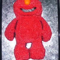 Elmo Sculpted chocolate cake covered in BC icing.