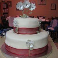 Leonwedding.jpg My first paid wedding cake! A fried called and needed a small wedding cake for the next day! Since it is difficult for me to say no to the...