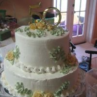 50Thanniv1.jpg This was for a small party my mother-in-law was having. Because of time constraints and a family illness, I ordered a plain white cake from...