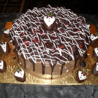 Strawberry Tuxedo Cake chocolate fudge cake with strawberry filling, whipped chocolate frosting........topped with fresh strawberries and them covered with...