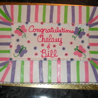 Shower Cake Decorated in buttercream with fondant accents. Made to match invitations.