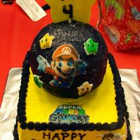 Quentin's Mario Cake My four year old son loves playing Mario! HIs face when he saw this cake made it all worthit!