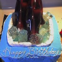 Cooler my first cooler cake and I made it for my best friends husband.