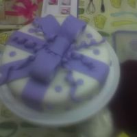Att00007.jpg My first bow cake. I think it turned out good.