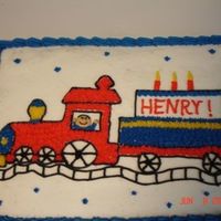 Train Birthday Cake I made this for a friend's little boy. He loved the train on the cake.