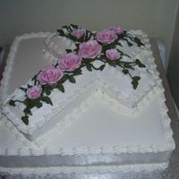 Funeral Another cake I did for a freinds funeral. Double layer yellow cake, whipped buttercream icing and gumpaste roses