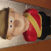 Grant Do Right Canadian Mountie..This was a going away cake for a friend of ours. The cake is three feet long and the face looks like our friend. His...