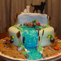 Dogs N Ducks I made this as a surprise for my bosses business partner. The animlas are plastic. Im not that good at sculpting yet LOLOL