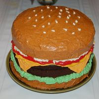 Cheeseburger First burger Ive made, second cake on this website.. all Buttercream, 2 vanilla and 1 choc cakes... hope u like it!